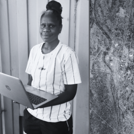 Ashialee with her laptop in a remote community supported by CAYLUS